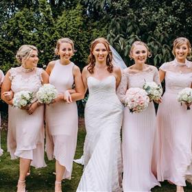 fwthumbBride and maids with flowers.jpg